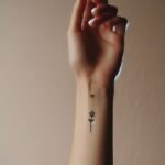 Tatuagem feminina no braço