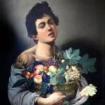 "Rapaz com cesto de frutas". Pintura barroca de Caravaggio.